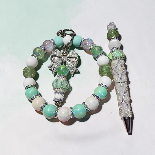 Blessed Bead worx beaded keychain and matching pen set in mint, white, and forest green with crystal bow charm