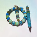 Blessed Bead worx ocean-themed beaded keychain bracelet and matching blue crystal-encrusted pen set