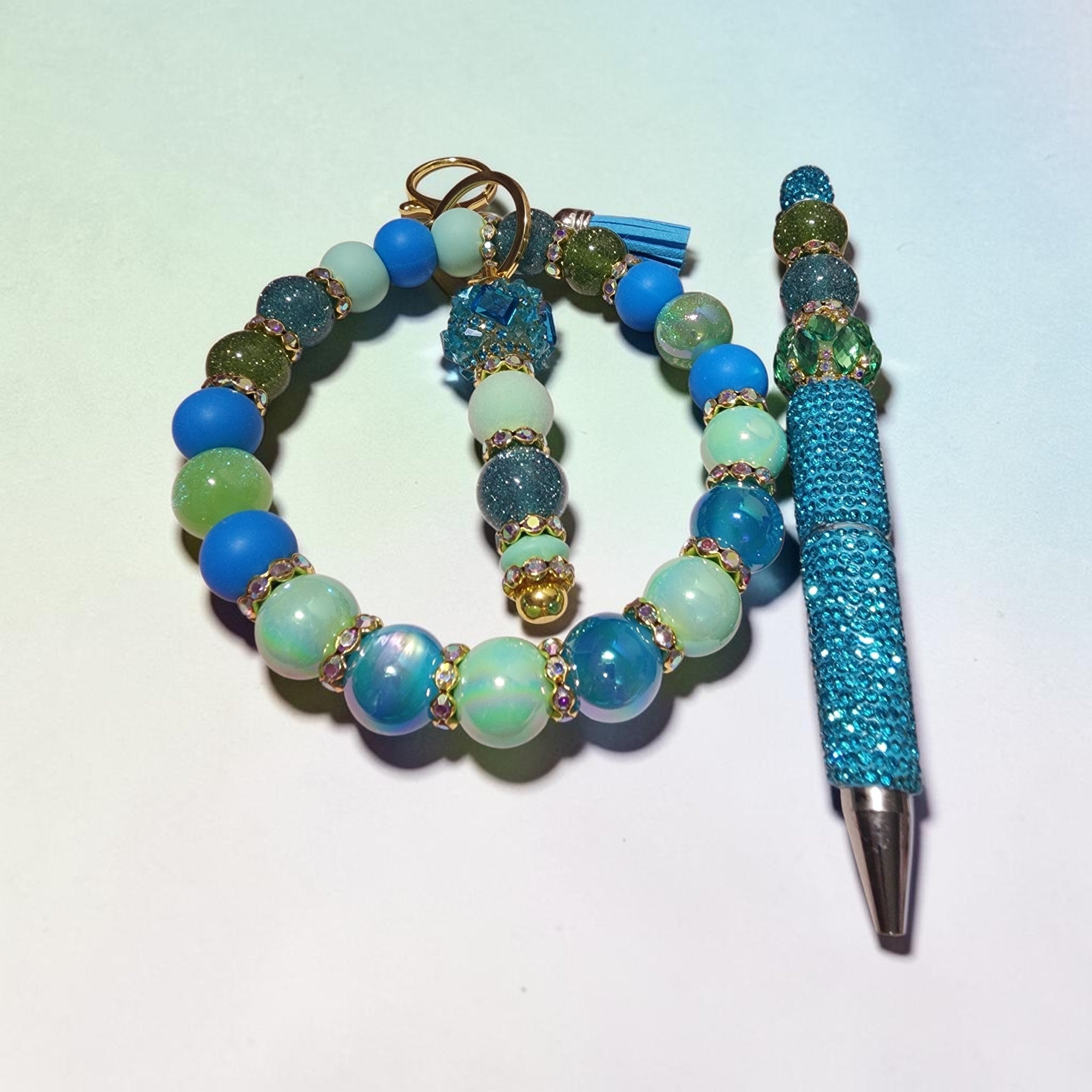 Blessed Bead worx ocean-themed beaded keychain bracelet and matching blue crystal-encrusted pen set